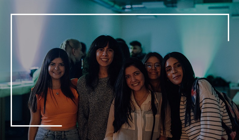 a group of women smiling